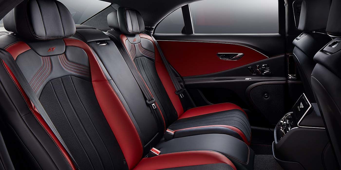 Bentley Mougins Bentley Flying Spur S sedan rear interior in Beluga black and Hotspur red hide with S stitching