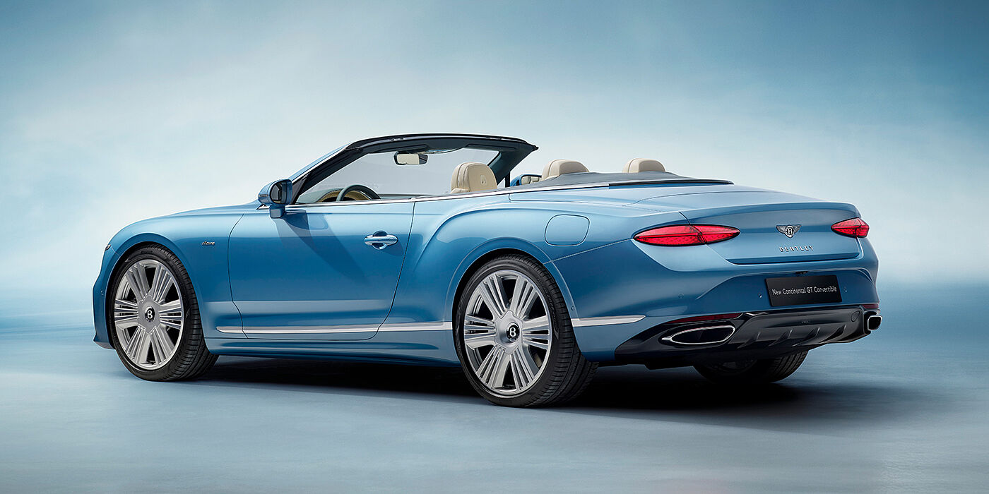 Bentley Mougins New Bentley Continental GTC Azure convertible rear view in Light Windsor blue paint with 22 inch ten spoke wheels and chrome exterior details