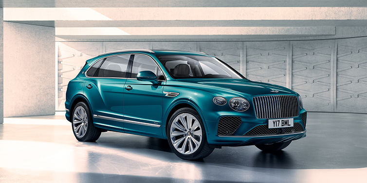 Bentley Mougins Bentley Bentayga Extended Wheelbase Azure SUV front three quarter in Topaz blue paint colour with a grey background