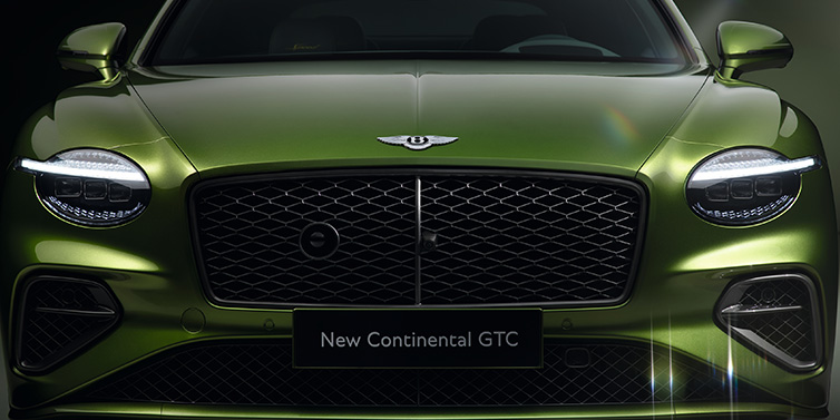 Bentley Mougins Bentley Continental GTC Speed convertible front bonnet detail in Tourmaline Green paint showing new light design